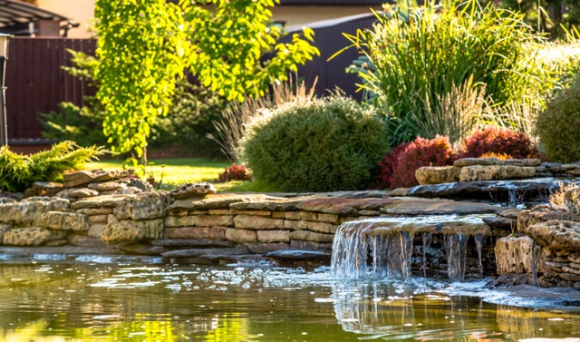 Custom backyard landscape water feature