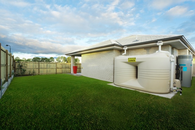 Backyard with water tank for drought-tolerant landscaping