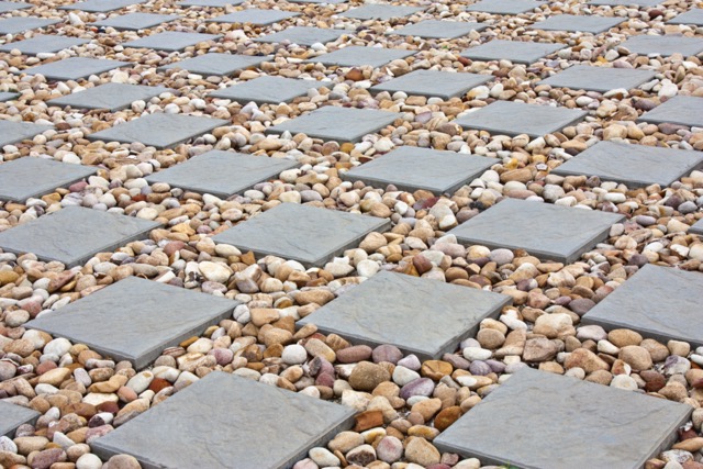 square paving with small stones in between